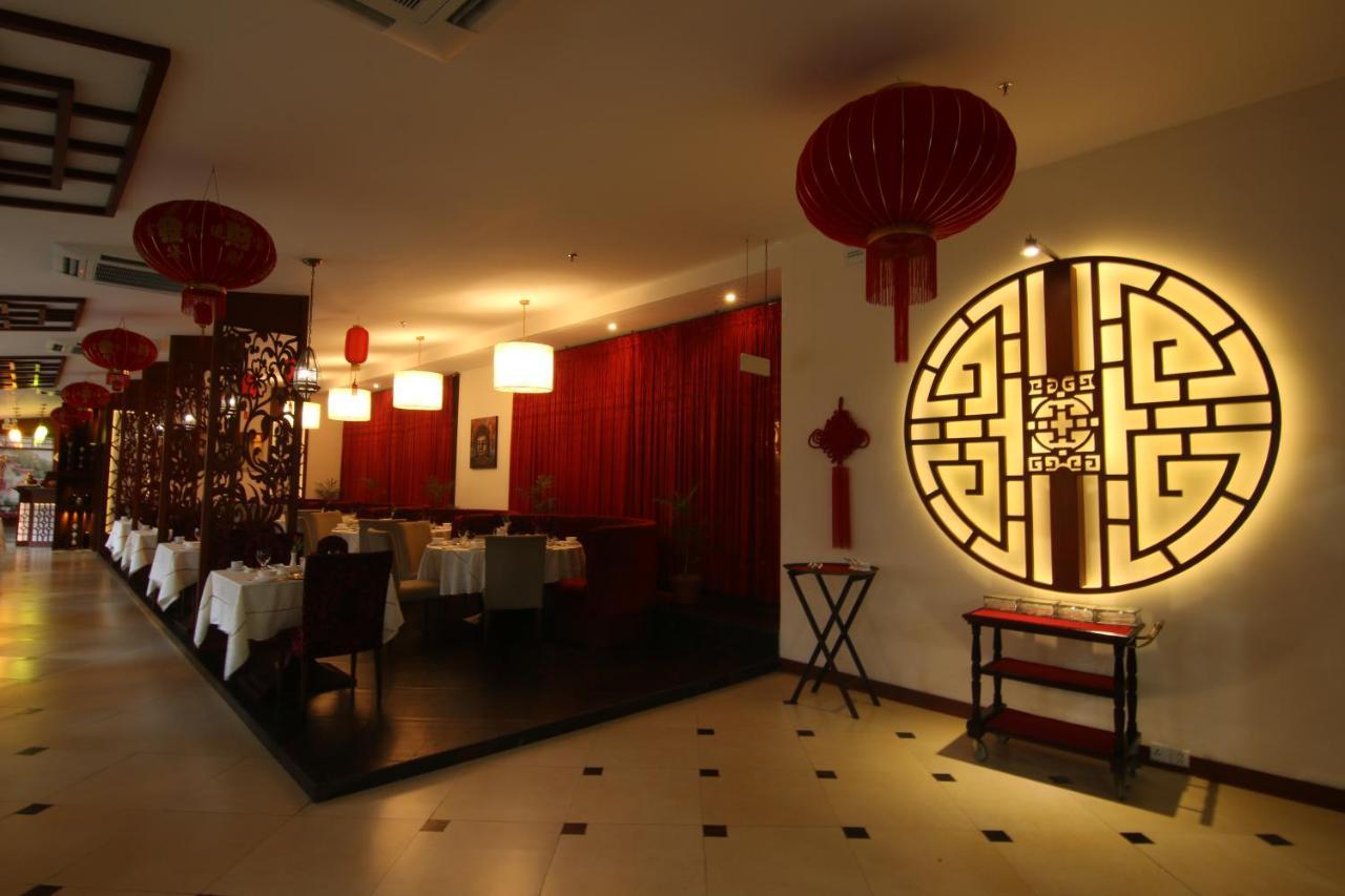 Ramada Plaza By Wyndham Karachi Airport Hotel Kültér fotó Interior of a restaurant in Beijing